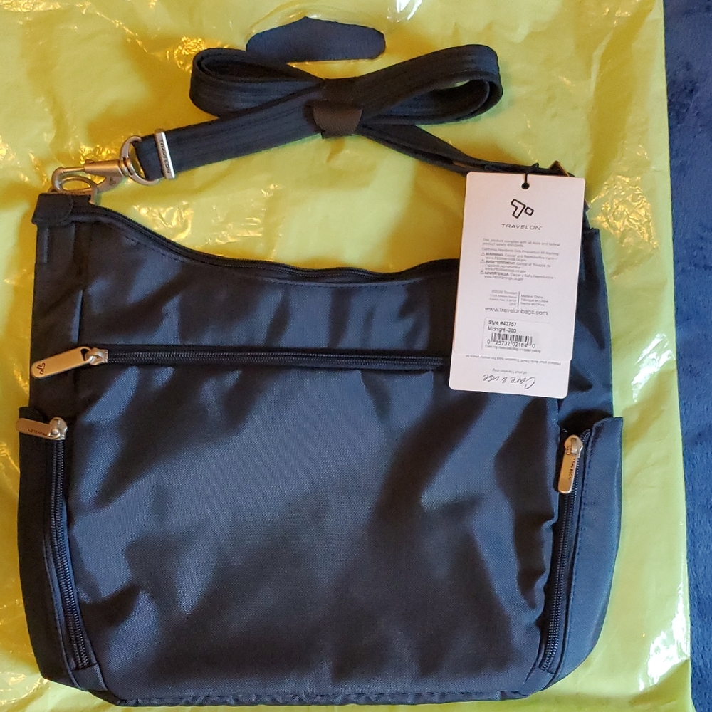Travelon Navy Messenger Bag with Gold Accents